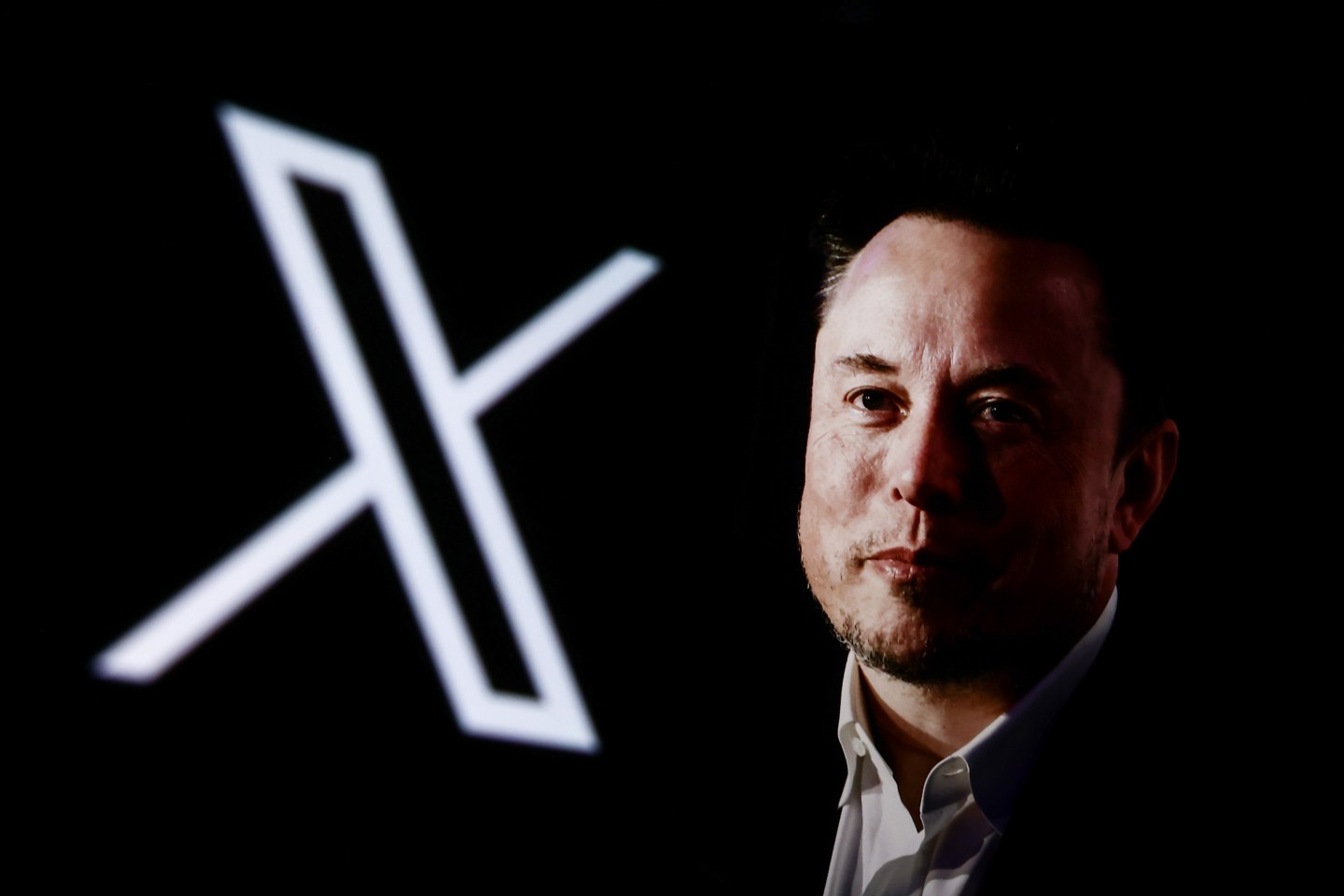 Elon Musk next to a logo for X.