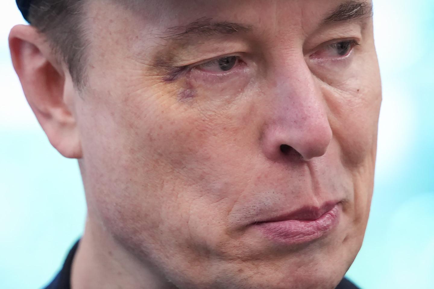 Tesla CEO Elon Musk listens as U.S. President Donald Trump speaks to reporters in the Oval Office of the White House on May 30, 2025 in Washington, DC.