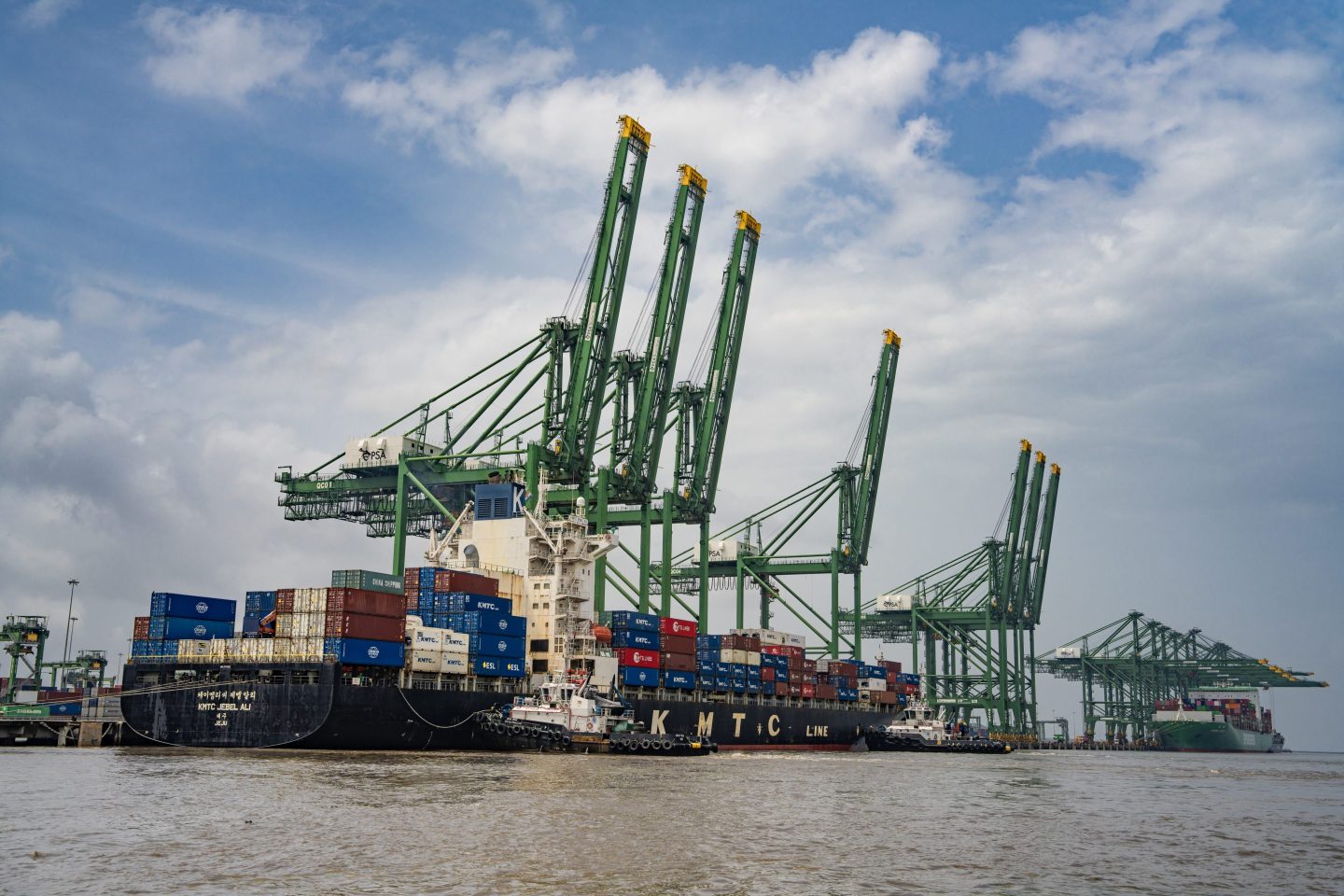 Shipping containers stacked on the KMTC Jebel Ali container ship at Jawaharlal Nehru Port in Navi Mumbai, Maharashtra, India, on Saturday, Aug. 9, 2025. 