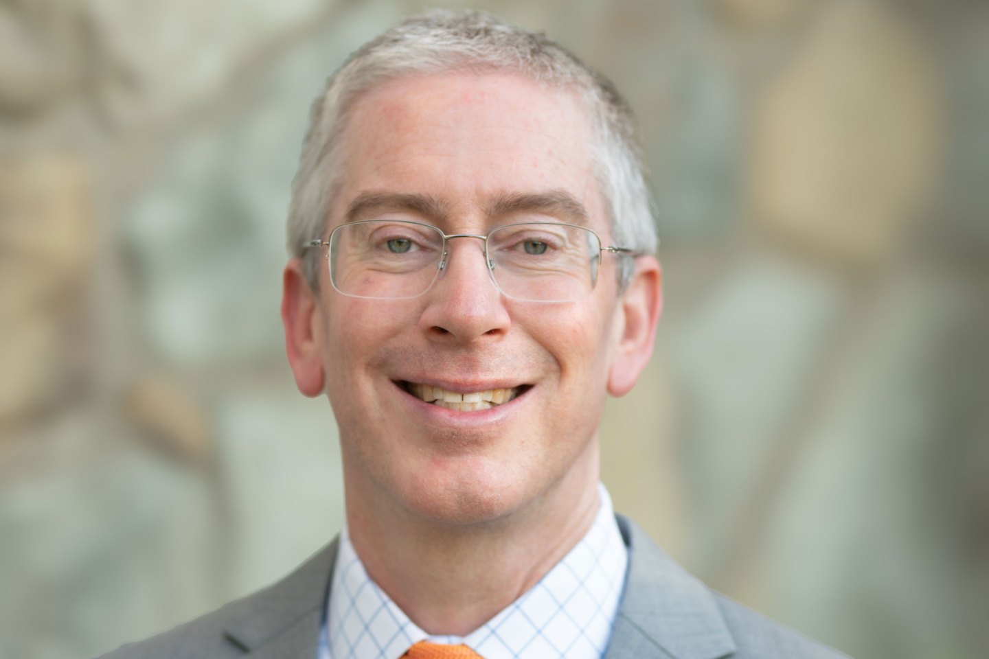 Bryan Caplan looks smilingly at the camera