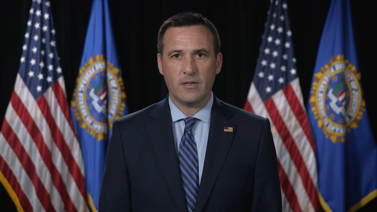 Brett Leatherman, Deputy Assistant Director for Cyber Operations at the Federal Bureau of Investigation, giving an address in August 2025. (Courtesy FBI)