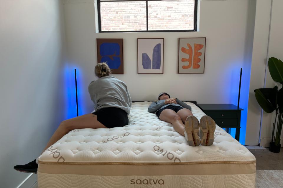 Couples test during Saatva mattress review.