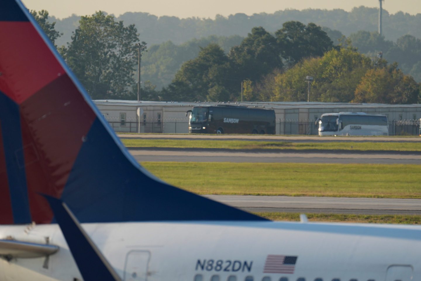 Buses carrying Korean workers detained arrives at Hartsfield-Jackson International Airport in Atlanta, Thursday, Sept. 11, 2025.