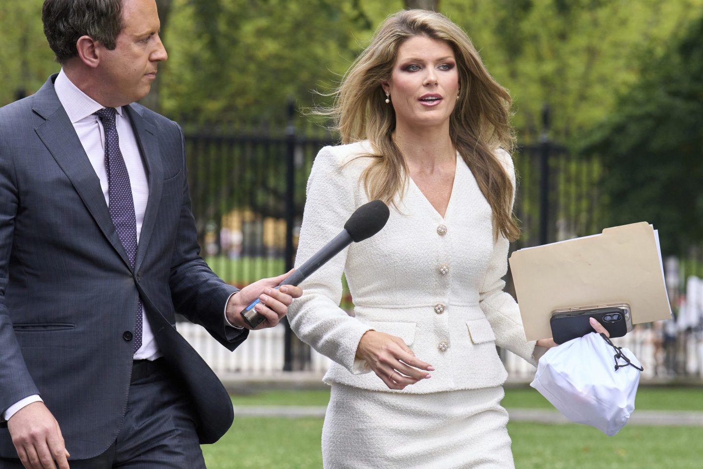 Lindsey Halligan, special assistant to the president, speaks with a reporter outside of the White House on Aug. 20.
