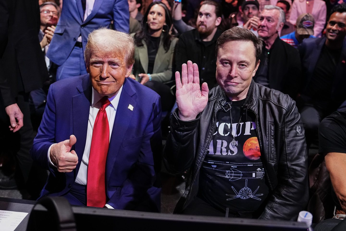 President-elect Donald Trump and Elon Musk pose for a photo, with Trump doing thumbs up and Musk raising his hand, during the UFC 309 event at Madison Square Garden on November 16, 2024 in New York City.