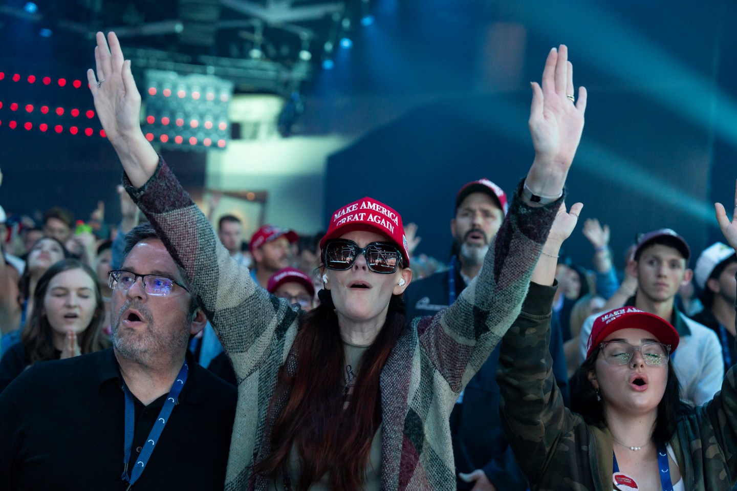 Conservatives worship and pray at a Turning Point USA conference