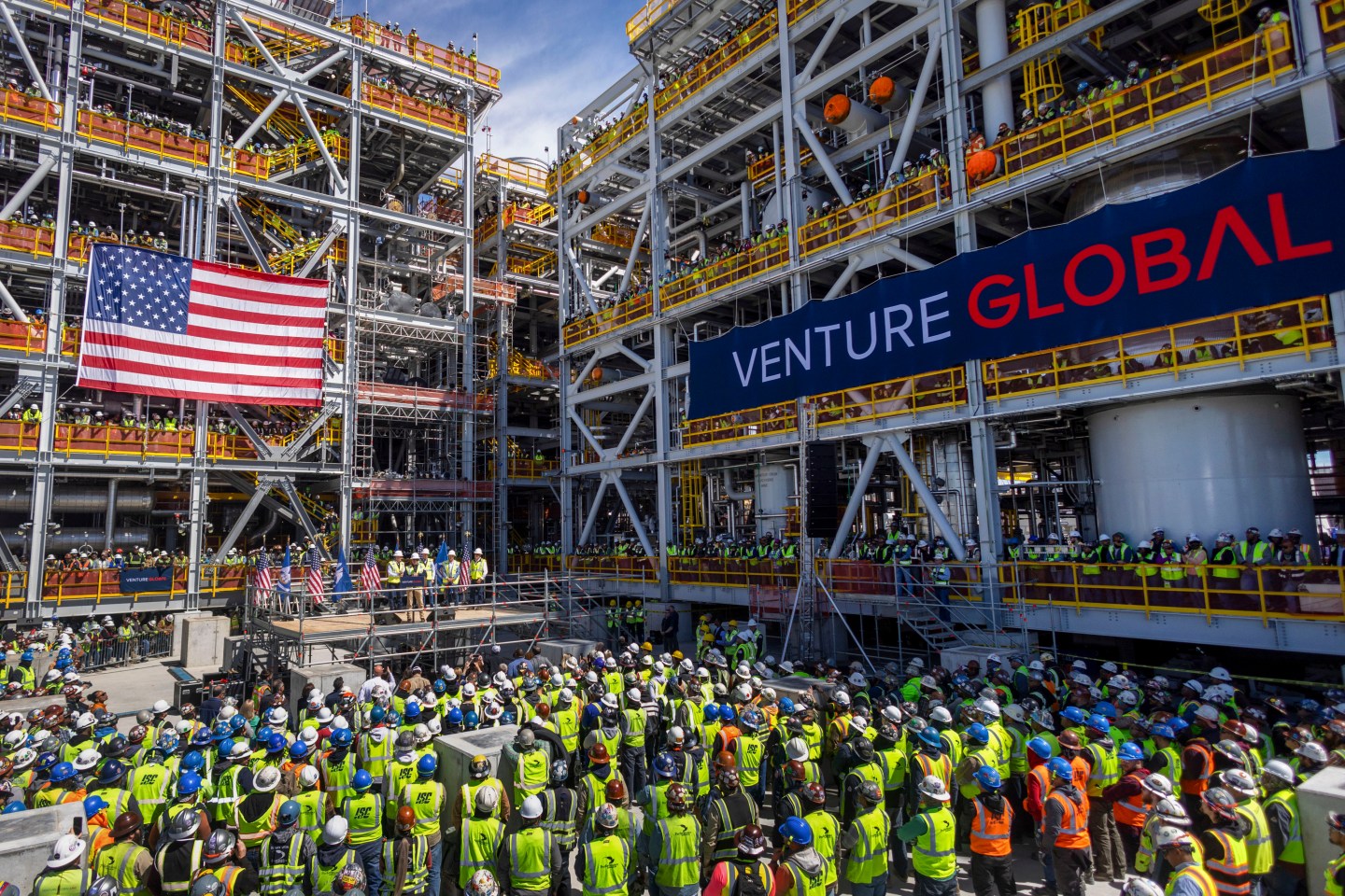 Venture Global CEO Mike Sabel, U.S. Interior Secretary Doug Burgum, Energy Secretary Chris Wright, and VG cofounder Bob Pender, speak to workers in March at the Venture Global Plaquemines liquefied natural gas (LNG) export facility in Port Sulphur, Louisiana. VG plans to expand its Plaquemines LNG facility south of New Orleans, bringing its total investment in current and planned U.S. projects to more than $75 billion. Photographer: Kathleen Flynn/Bloomberg via Getty Images