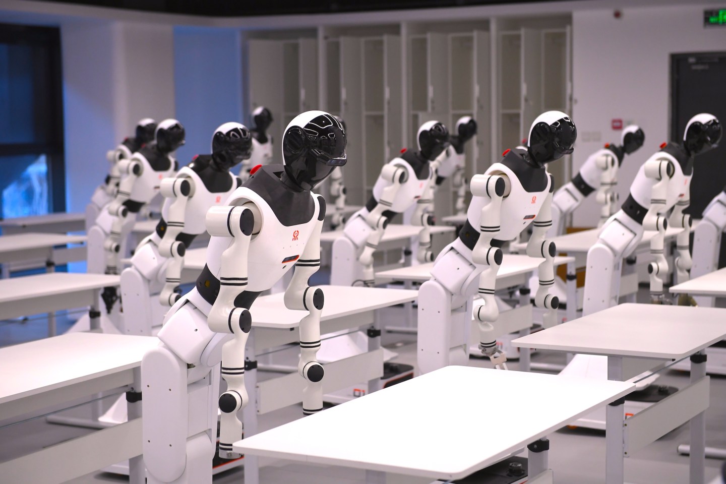 Photo: BEIJING, CHINA - MARCH 28: Humanoid robots at the humanoid robot innovation center at Shougang Park on March 28, 2025 in Beijing, China. A humanoid robot innovation center was established in Beijing to accelerate the technology supply and industrialization of humanoid robots.
