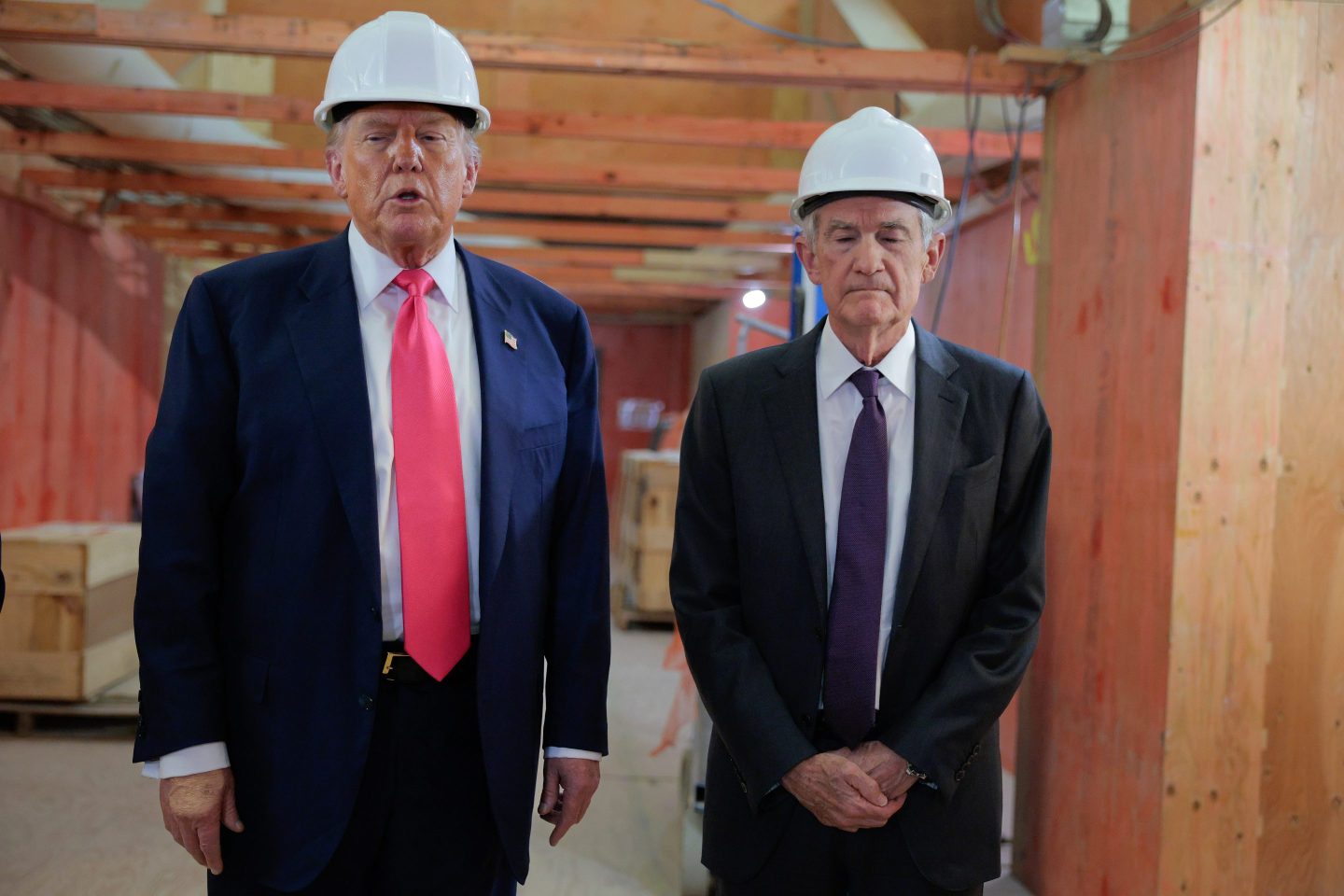 President Donald Trump (L) and Federal Reserve Chair Jerome Powell