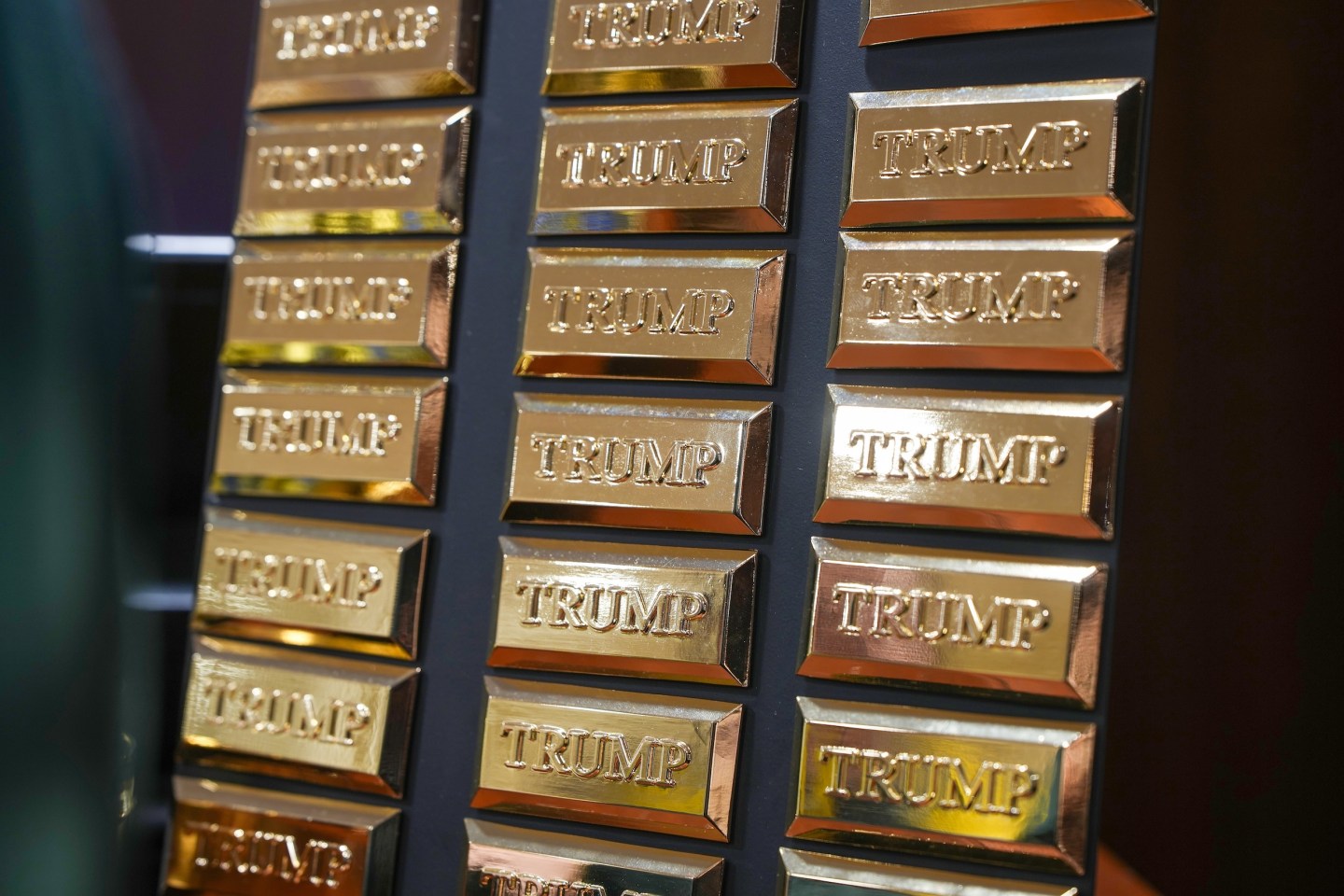 Photo: TURNBERRY, SCOTLAND - JULY 28: Trump branded gold coloured bullion fridge magnets are seen for sale at the recently opened Trump merchandise store at Trump Turnberry golf course on July 28, 2025 in Turnberry, Scotland. U.S. President Donald Trump is visiting his Trump Turnberry golf course, as well as Trump International Golf Links in Aberdeenshire, during a brief visit to Scotland from July 25 to 29. (Photo by Christopher Furlong/Getty Images)