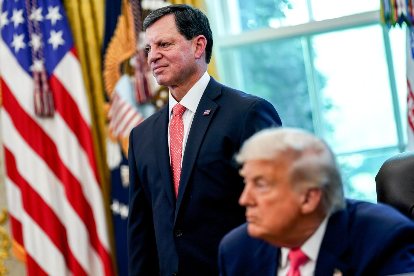 Frank Bisignano, commissioner of the US Social Security Administration, left, and US President Donald Trump in the Oval Office of the White House in Washington, DC, US, on Thursday, Aug. 14, 2025.