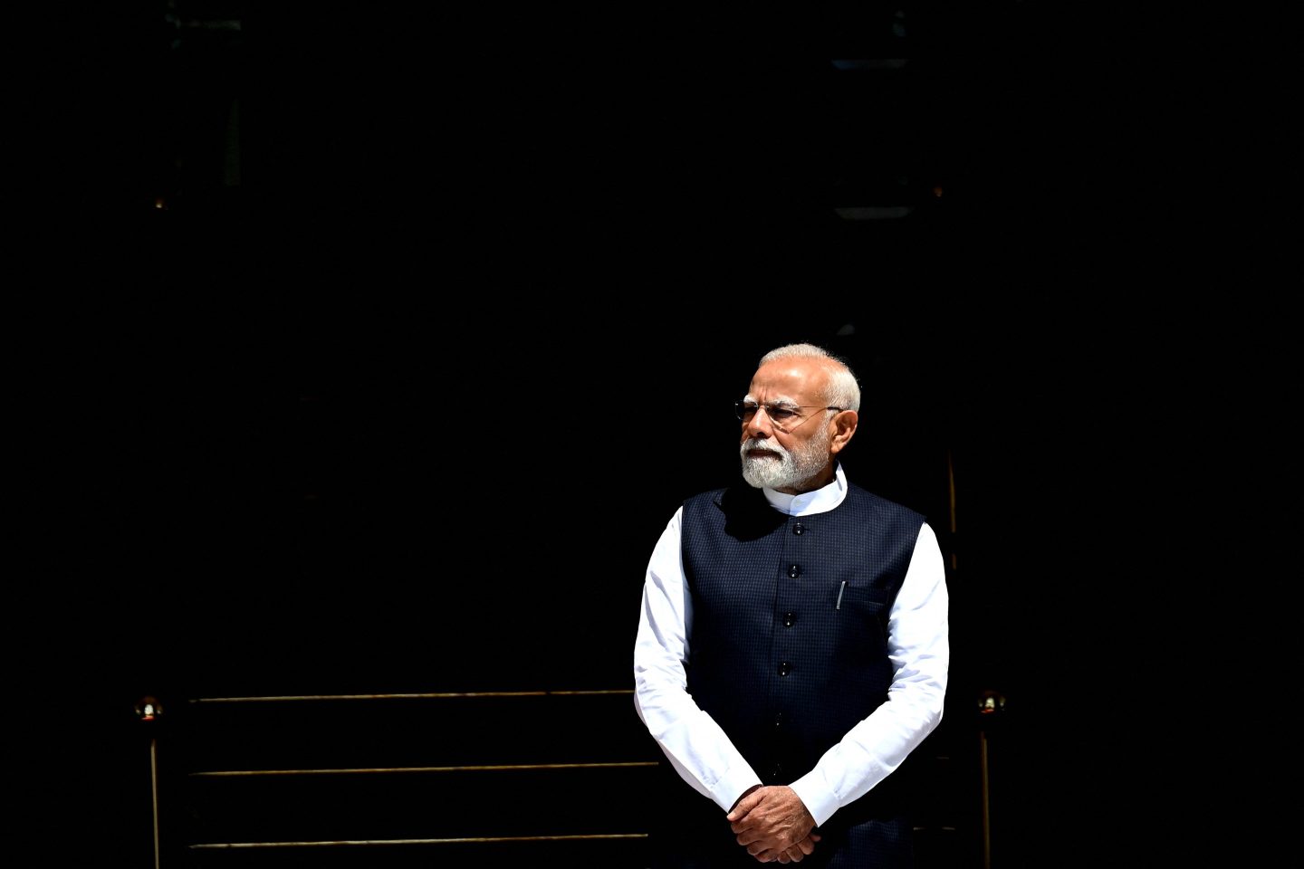 TOPSHOT - India's Prime Minister Narendra Modi waits to receive his Singaporean counterpart Lawrence Wong, at the Hyderabad House in New Delhi on September 4, 2025. (Photo by Sajjad HUSSAIN / AFP) (Photo by SAJJAD HUSSAIN/AFP via Getty Images)