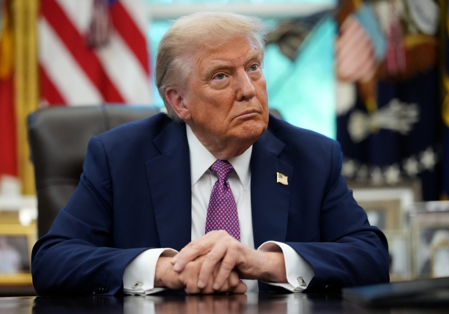 U.S. President Donald Trump speaks to the media while signing executive orders in the Oval Office of the White House on September 05, 2025 in Washington, DC.