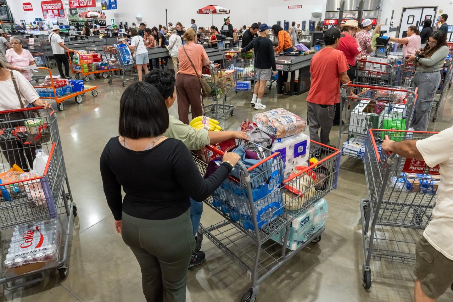 Shoppers wait to check out inside a Costco store in Napa, California, US, on Monday, Sept. 22, 2025.