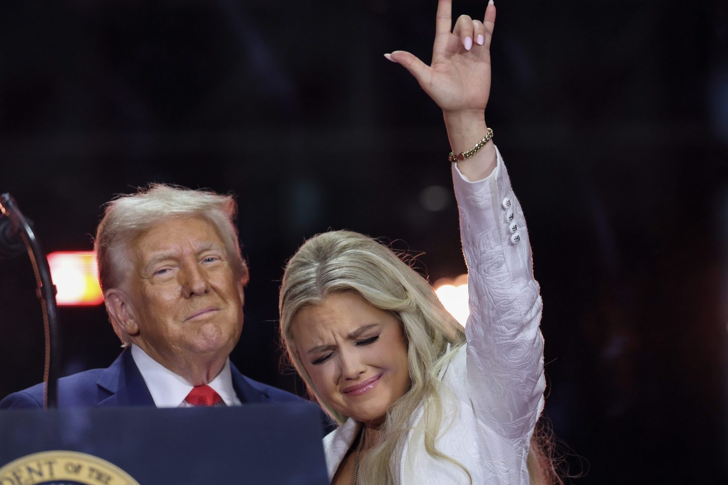 Erika Kirk and President Donald Trump onstage during the memorial service for Charlie Kirk at State Farm Stadium in Glendale, Arizona, on Sunday.