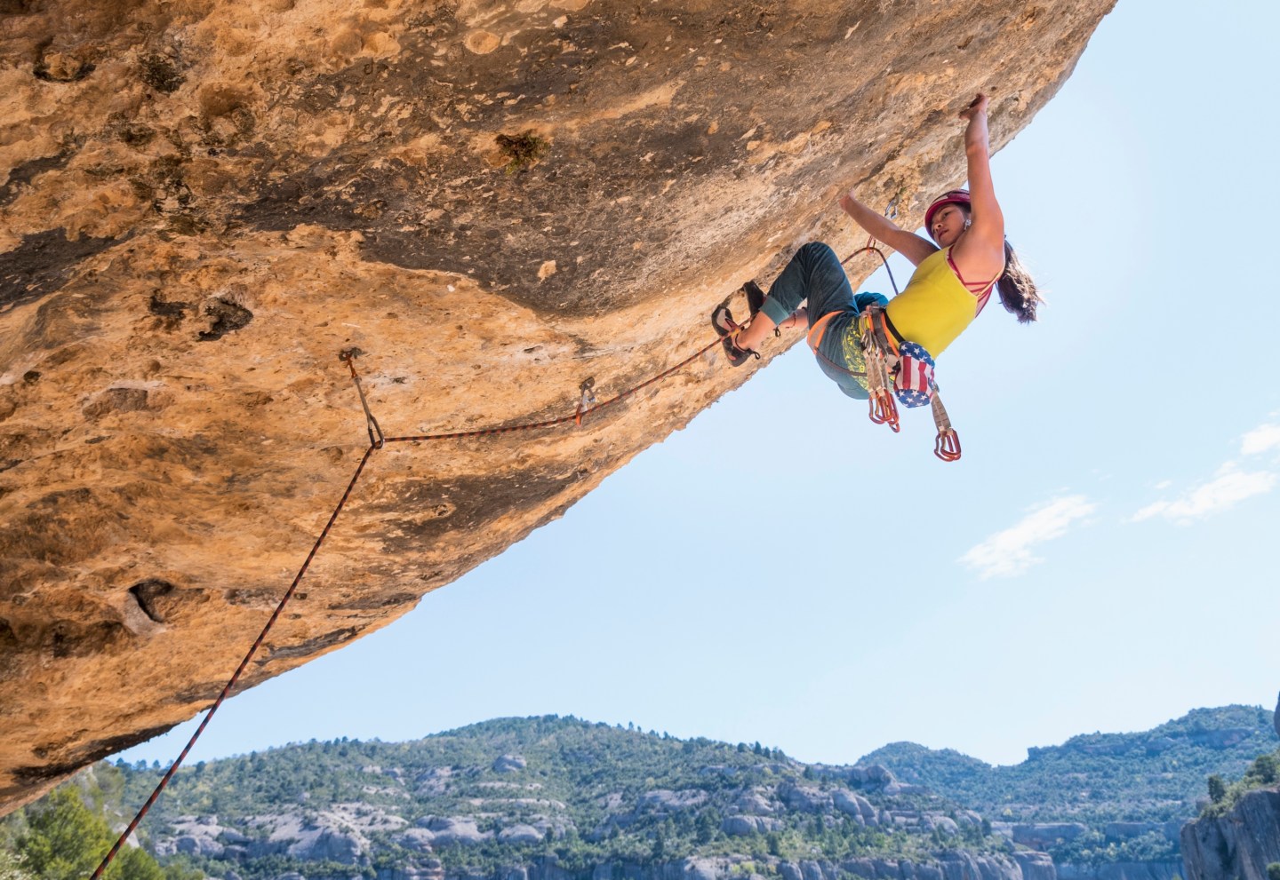 Photo of a woman rock climbing