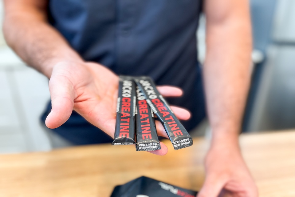 Tester showing single-serving creatine packets