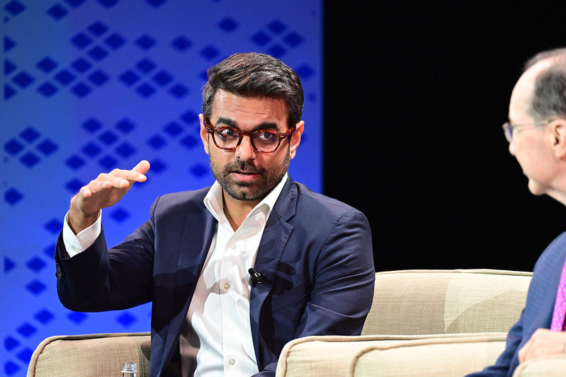 Anjney Midha, a general partner at Andreessen Horowitz speaking on stage.