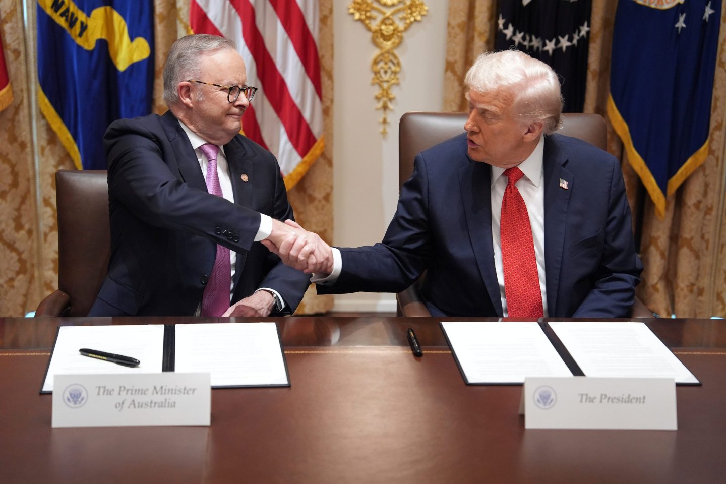 resident Donald Trump, right, shakes the hand of Australian Prime Minister Anthony Albanese during a meeting in the Cabinet Room of the White House, Monday, October 20, 2025, in Washington.