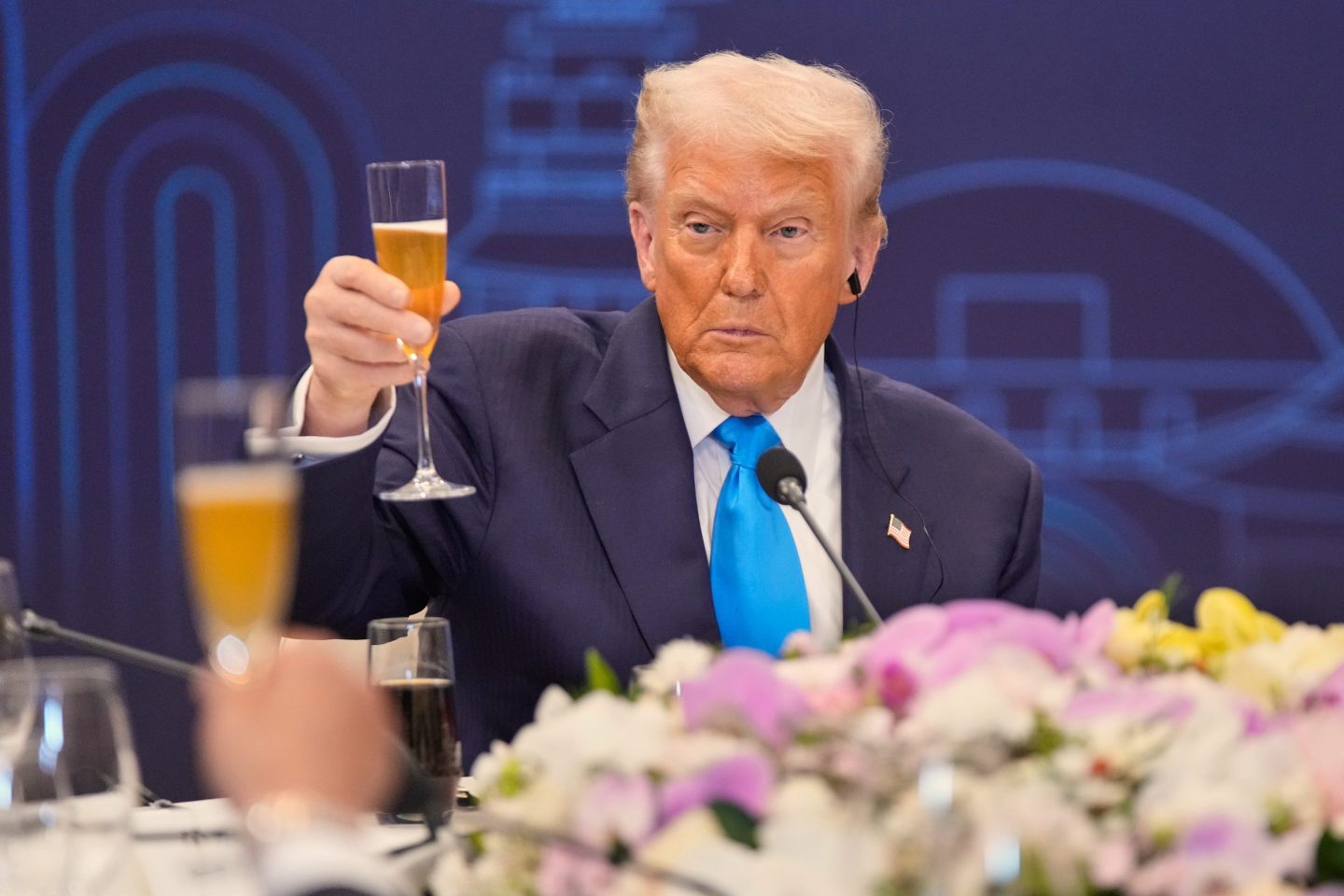 President Donald Trump toasts with state leaders during a dinner event hosted by South Korean President Lee Jae Myung in South Korea on Wednesday.