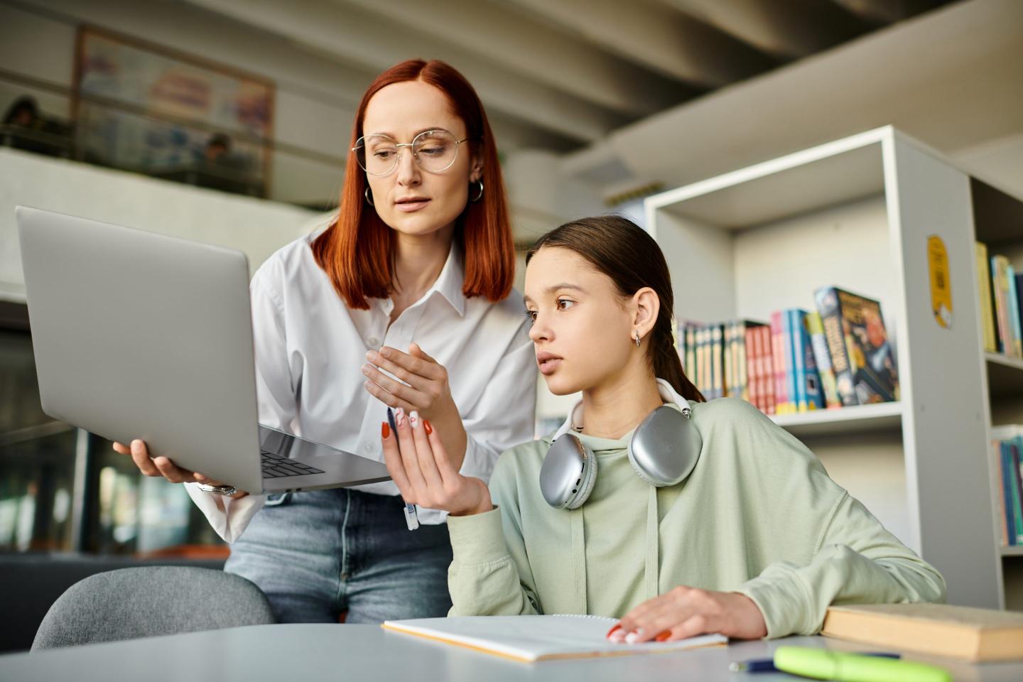 Young girl being tutored at home