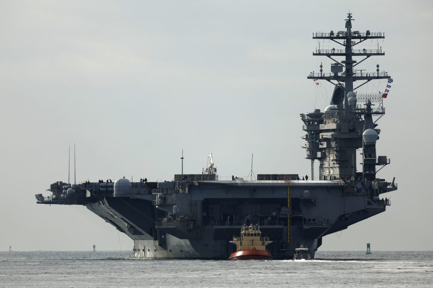 SAN DIEGO, CALIFORNIA - NOVEMBER 18: The U.S Navy USS Nimitz (CVN-68), the world's oldest nuclear-powered aircraft carrier sails out of San Diego Bay to the Pacific Ocean to perform readiness drills before returning its homeport of Naval Base Kitsap on November 18, 2024 in San Diego, California. The ship is scheduled to be decommissioned in fiscal 2026. (Photo by Kevin Carter/Getty Images)