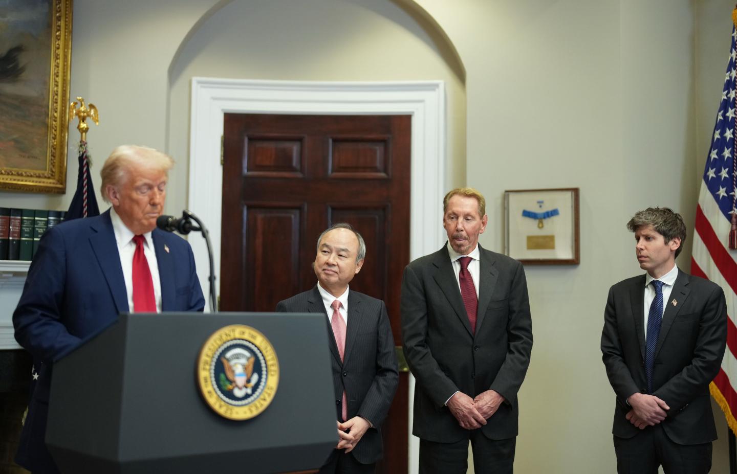 President Donald Trump, center, delivers remarks about AI infrastructure with Masayoshi Son, chairman and CEO of SoftBank Group Corp, Larry Ellison, executive charmain Oracle, and Sam Altman, CEO of Open AI in the Roosevelt Room of the White House, on January 21, 2025, in Washington, DC. (Photo by Jabin Botsford /The Washington Post via Getty Images)