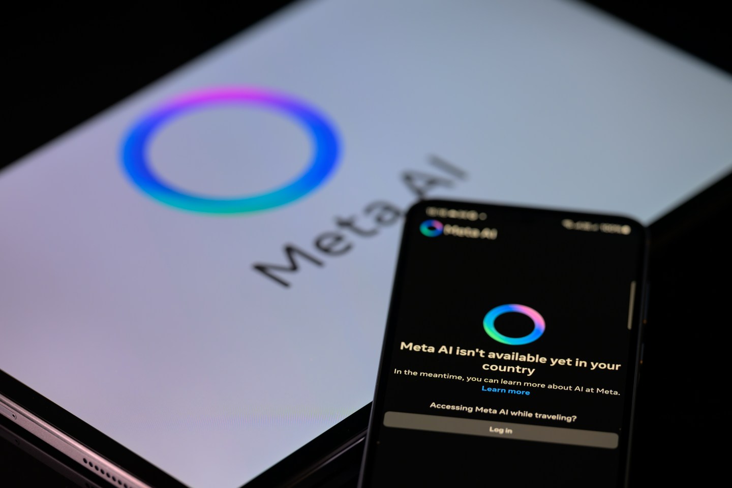 Meta AI on a laptop and phone.