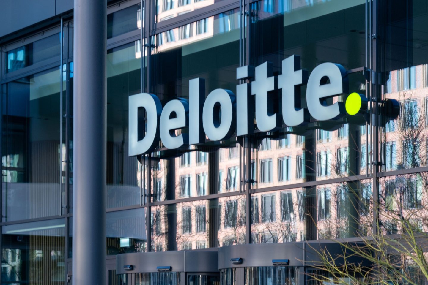 Logo consulting company Deloitte Touche Tohmatsu Limited building in downtown Frankfurt, multinational professional services network, Big Four accounting firms, Frankfurt - January, 19, 2025.