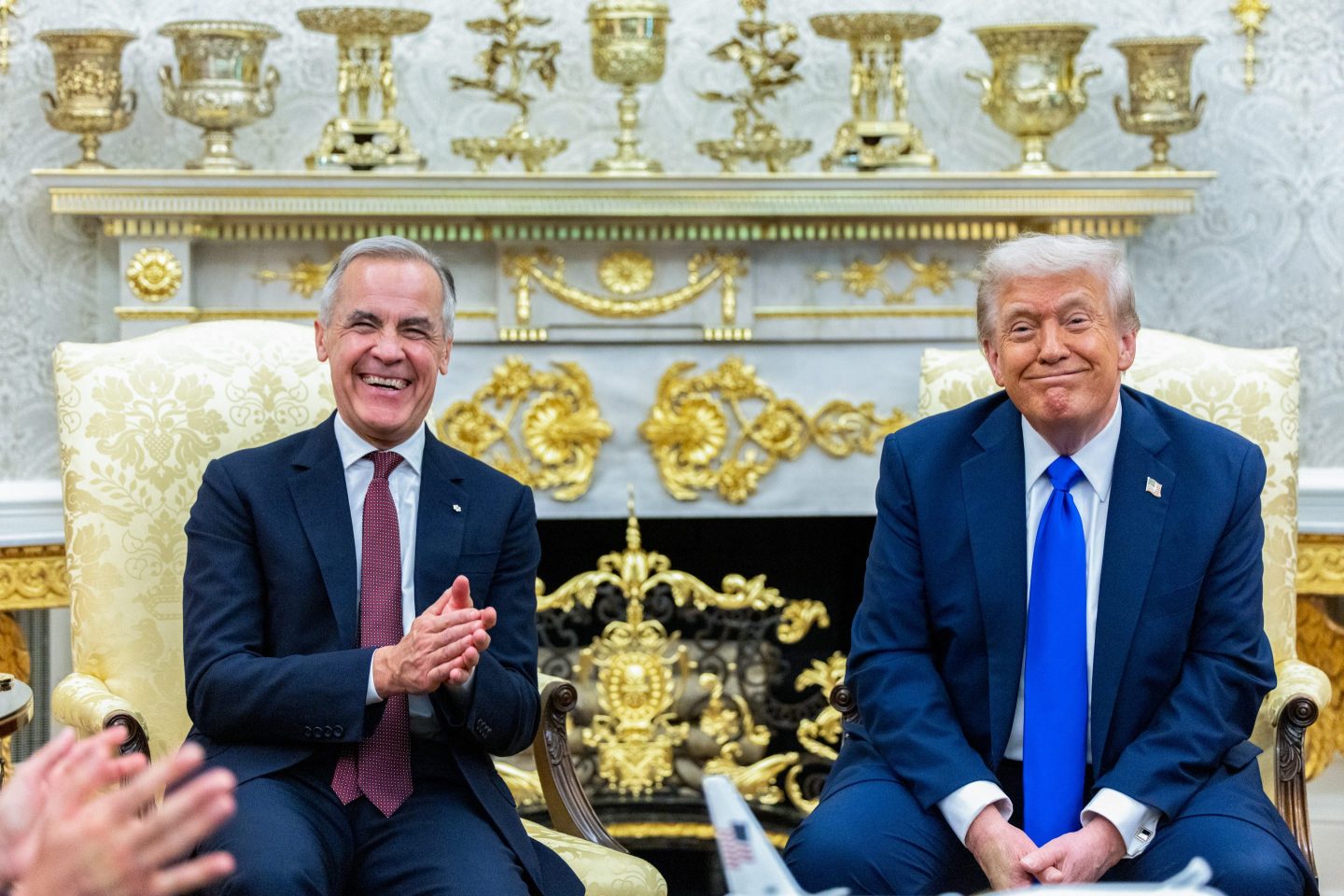 US President Donald Trump, right, and Mark Carney, Canada's prime minister, during a meeting in the Oval Office of the White House in Washington, DC, US, on Tuesday, Oct. 7, 2025.