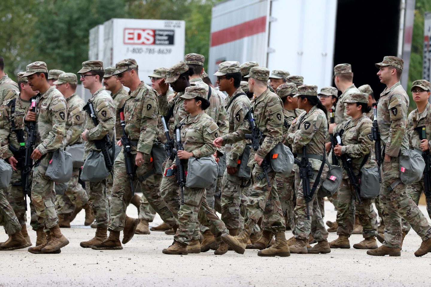 Members of the Texas National Guard assemble in Elwood, Illinois, at the Army Reserve Training Center in the southwest suburb of Chicago, on Tuesday.