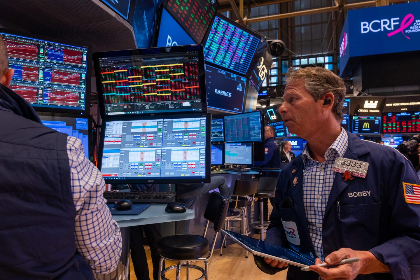 Traders work on the floor of the New York Stock Exchange on Oct. 17.