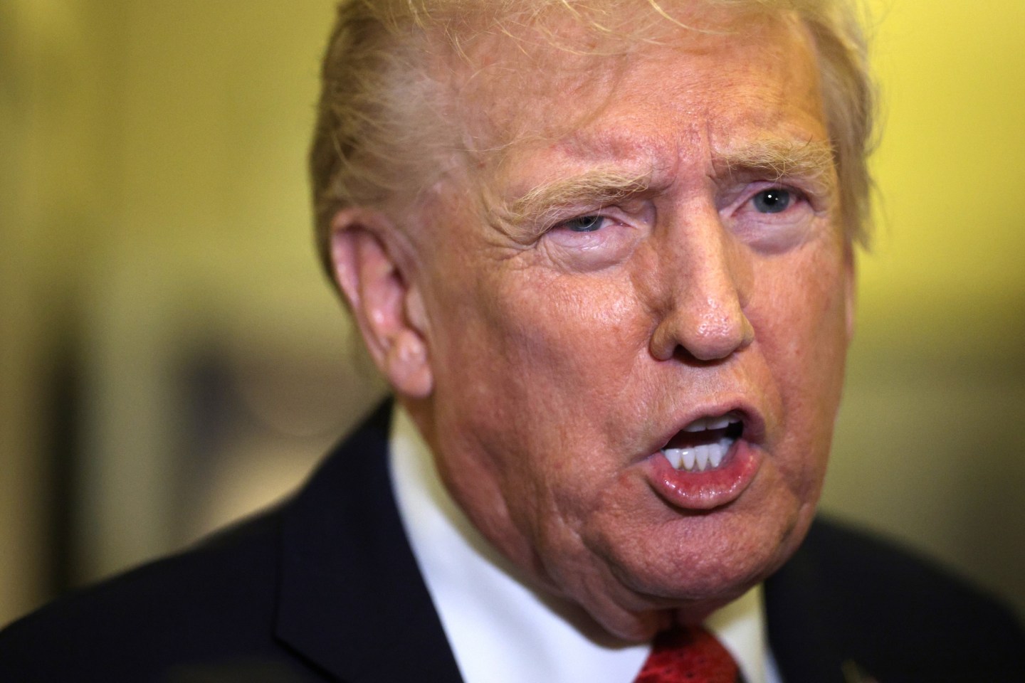 Photo: IN FLIGHT - OCTOBER 19: U.S. President Donald Trump speaks to members of the press on October 19, 2025 aboard Air Force One. The President is returning to Washington, DC, after spending his weekend at Mar-a-Lago resort in Palm Beach, Florida. (Photo by Alex Wong/Getty Images)