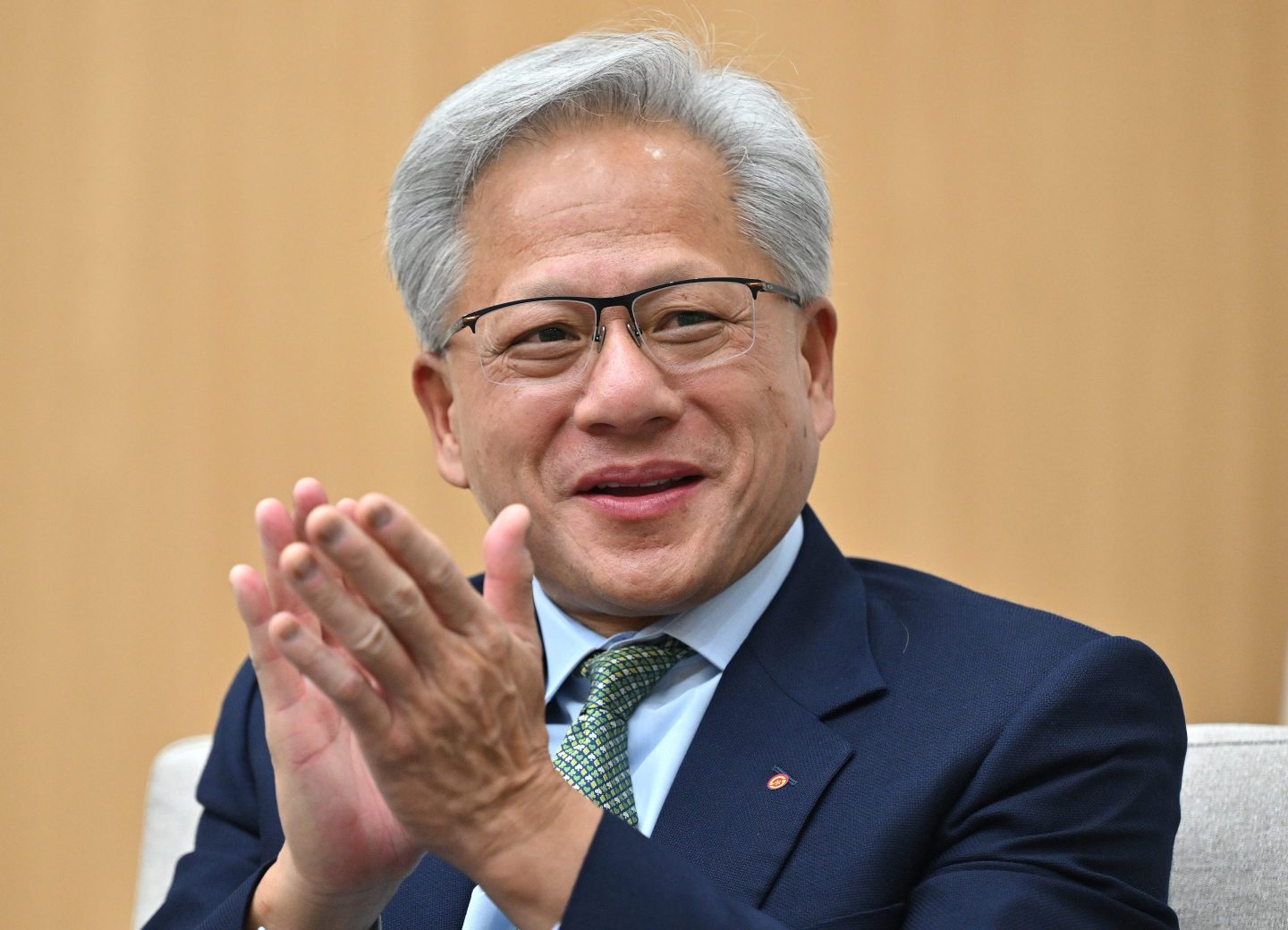 Nvidia founder and CEO Jensen Huang reacts during a meeting with South Korean President Lee Jae Myung on the sidelines of the Asia-Pacific Economic Cooperation (APEC) summit in Gyeongju on October 31, 2025 in Gyeongju, South Korea.