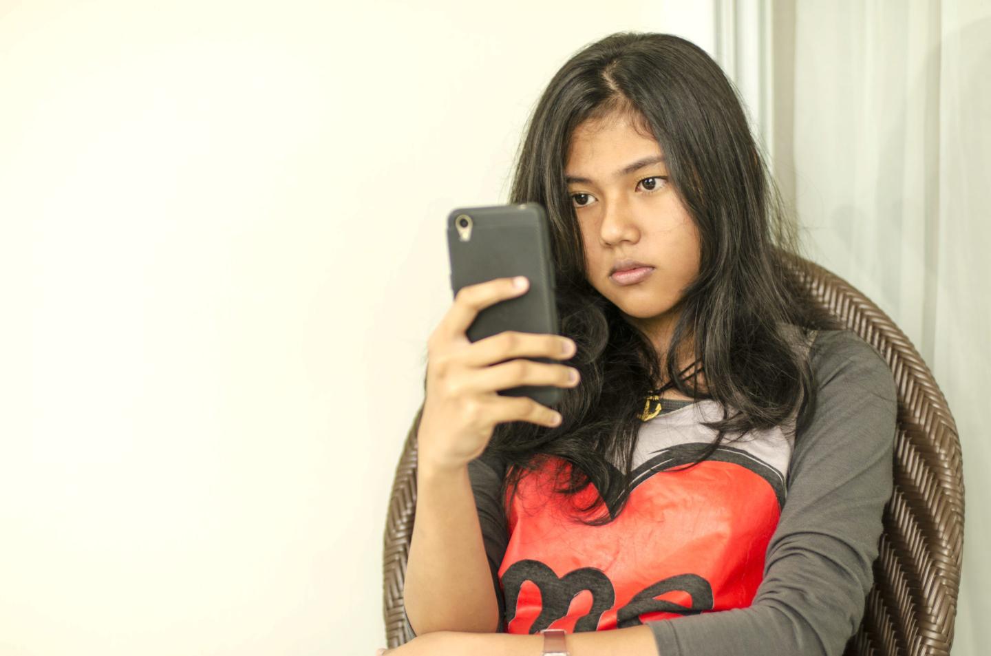 Looking at phone