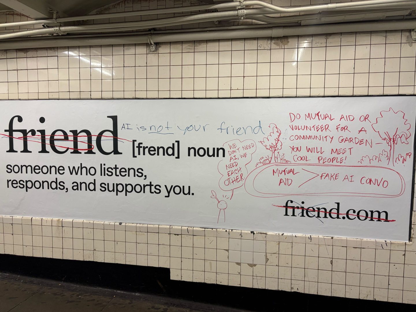 A photo of a poster for friend.com defaced with graffiti.