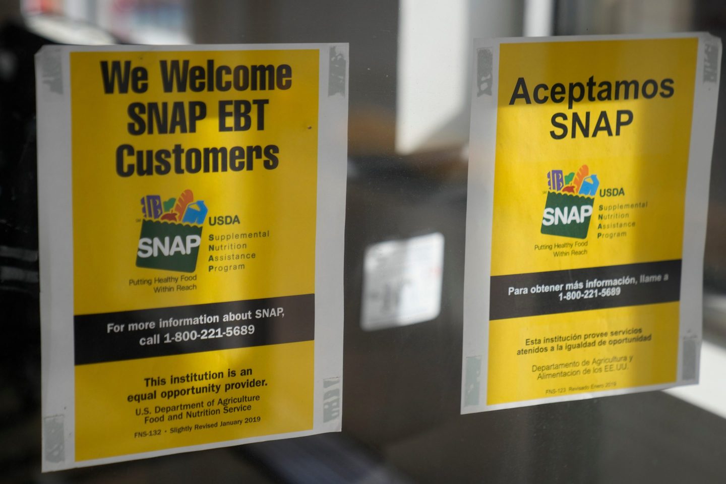 Signage showing that USDA Supplemental Nutrition Assistance Program (SNAP) is accepted, is displayed at Wild Onion Market, Monday, Oct. 27, 2025, in Chicago.