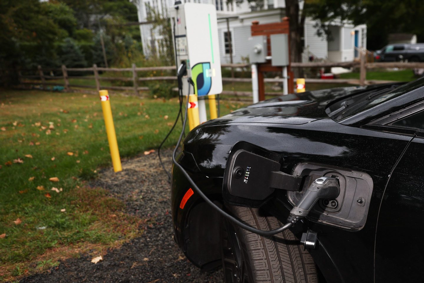 An electric vehicle is plugged into a Level 2 EV charger on Oct. 11, 2025, in Norwalk, Conn.