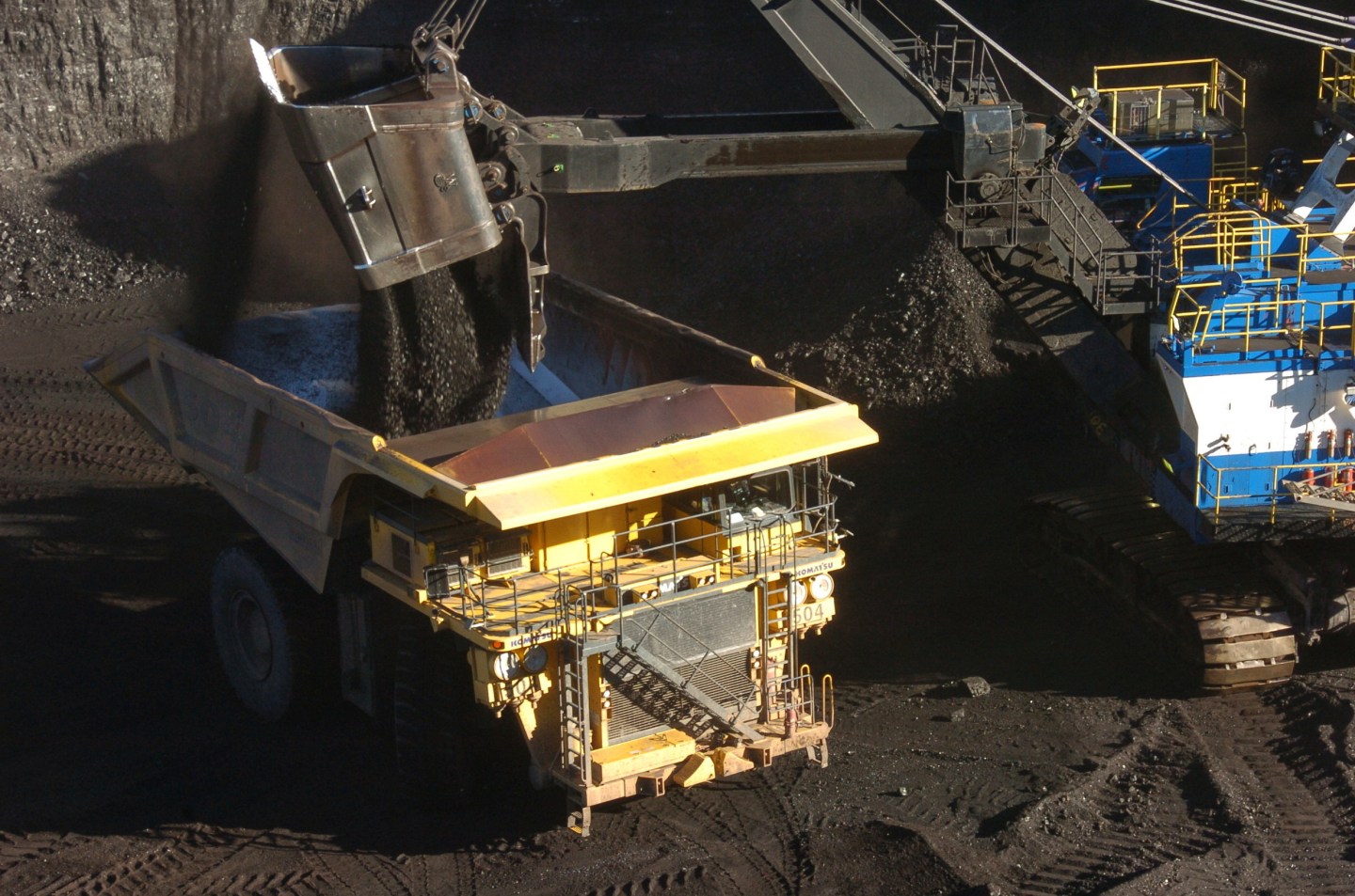 A mechanized shovel loads coal into a haul truck at a mine near Decker, Mont., on Nov. 15, 2016.