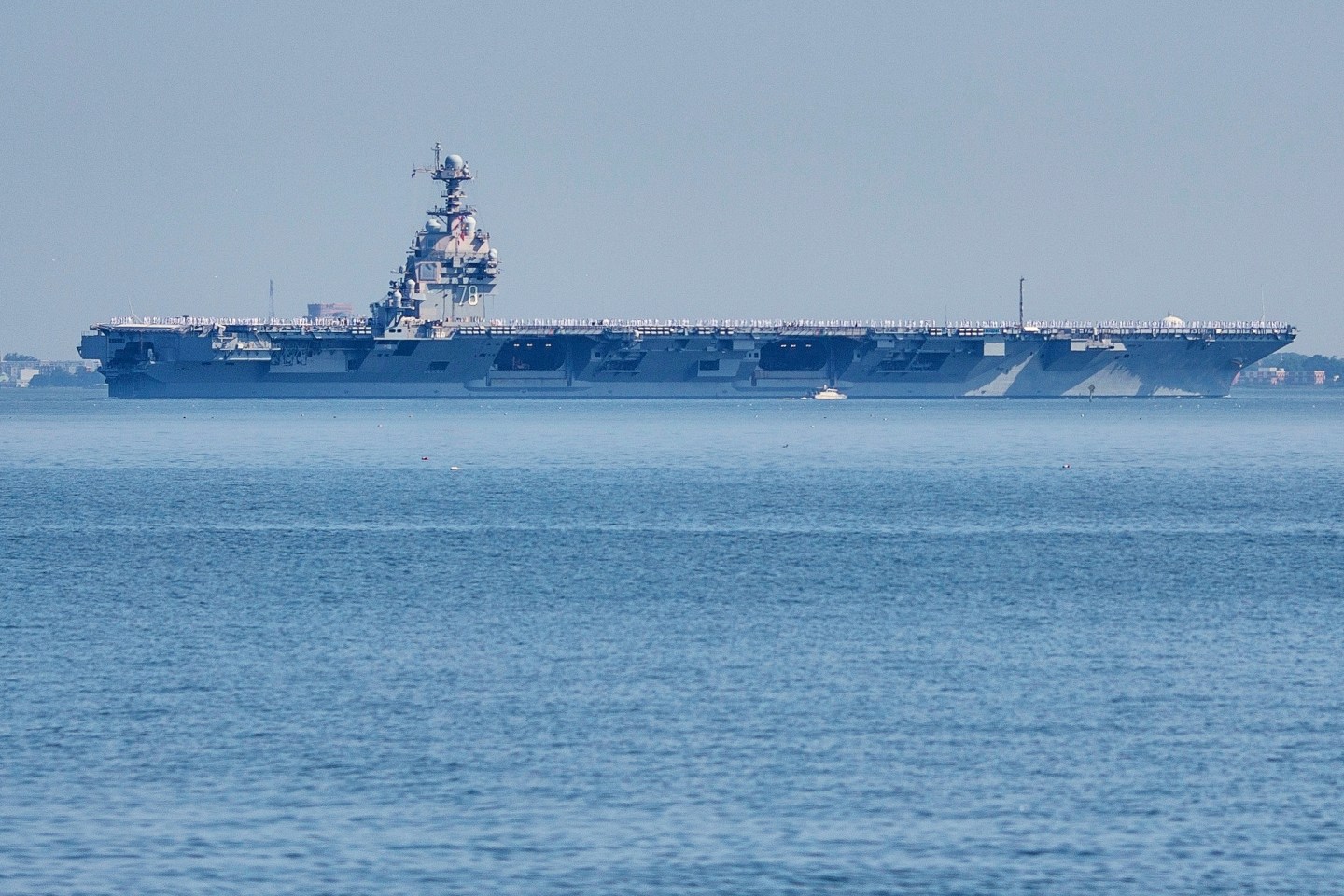 The USS Gerald R. Ford aircraft carrier leaves Naval Station Norfolk on June 23, 2025.