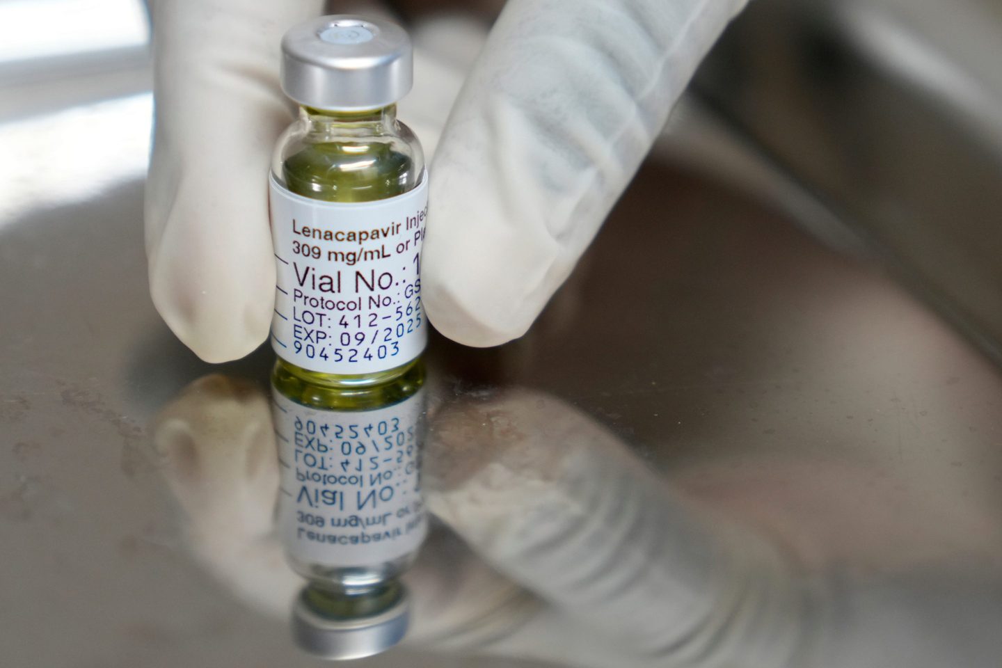 A pharmacist holds a vial of lenacapavir, an injectable HIV prevention drug, at the Desmond Tutu Health Foundation's Masiphumelele Research Site, in Cape Town, South Africa, July 23, 2024.