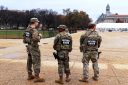 National Guard members stand on the National Mall in Washington DC