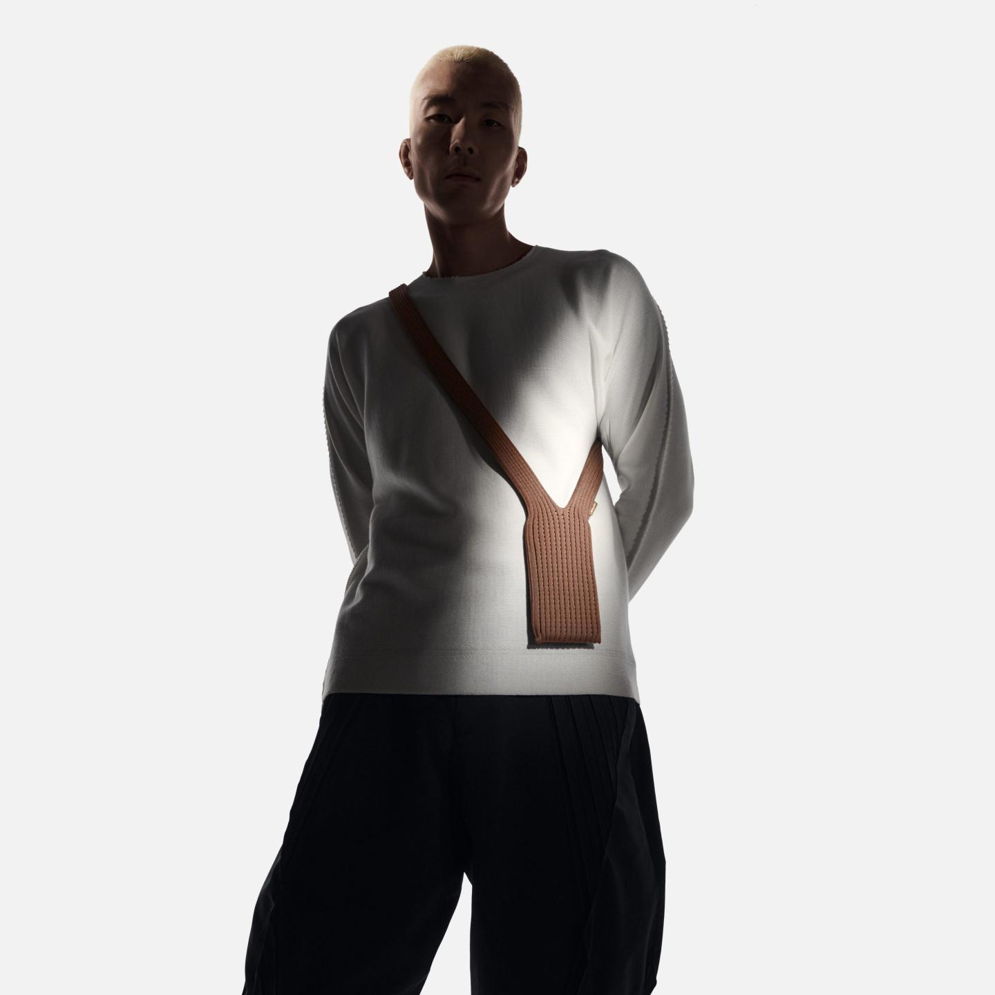 A man wearing the new iPhone Pocket