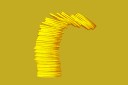 A stack of coins tumbles over on top of a solid background.