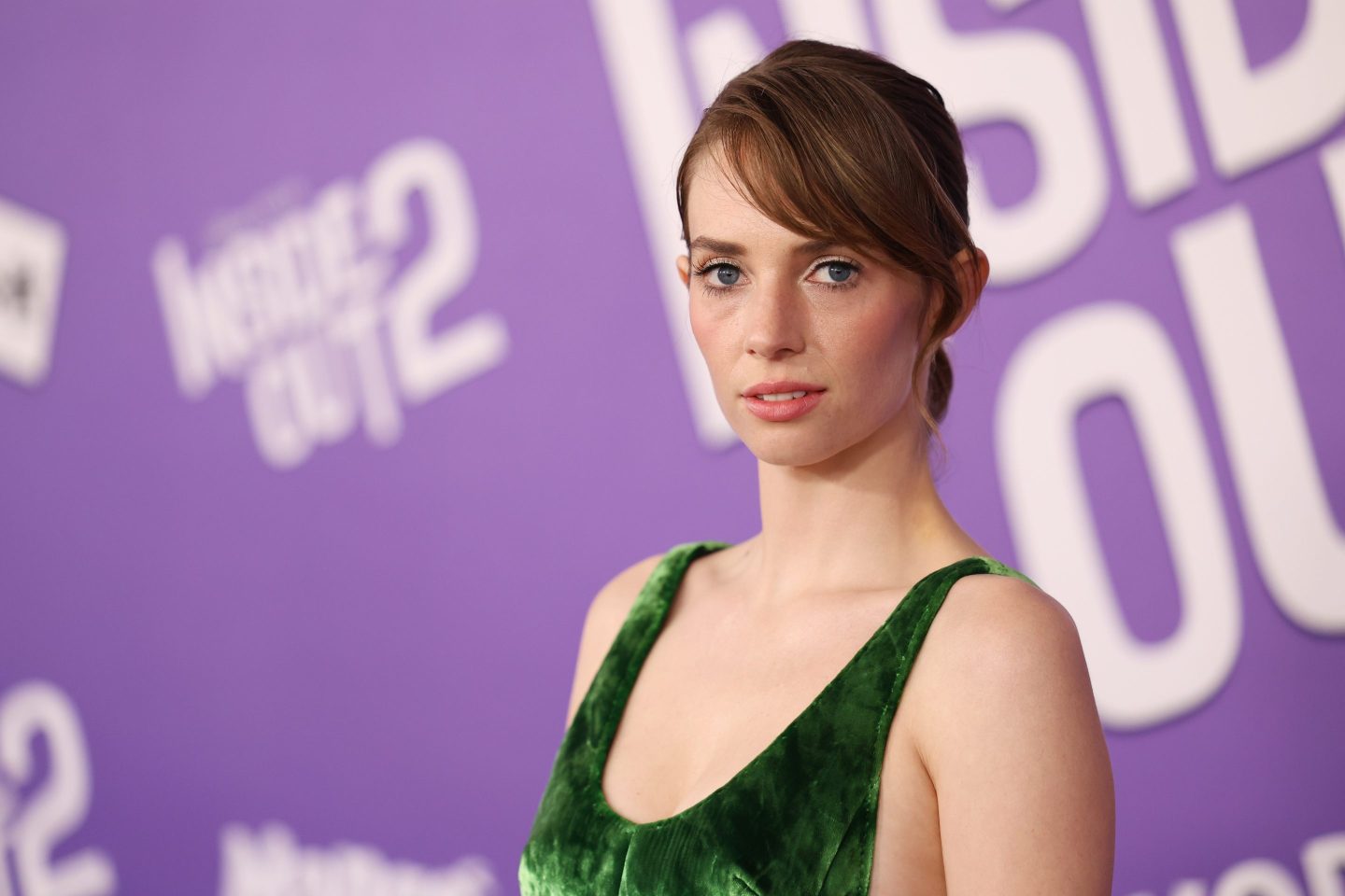 Maya Hawke poses on the red carpet for the Inside Out 2 premiere