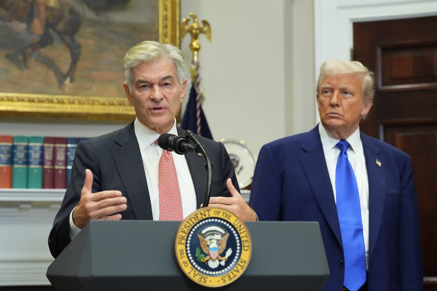 Mehmet Oz, administrator of the Centers for Medicare & Medicaid Services, and President Donald Trump during a news conference in the Roosevelt Room of the White House on Monday, May 12, 2025.