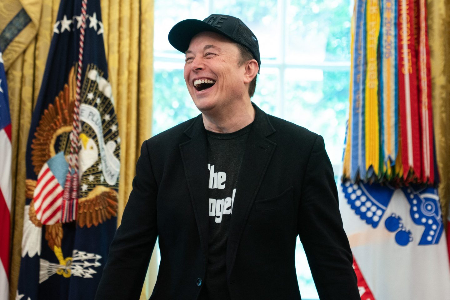 Tesla CEO Elon Musk laughs during a news conference with US President Donald Trump in the Oval Office of the White House in Washington, DC, on May 30, 2025.