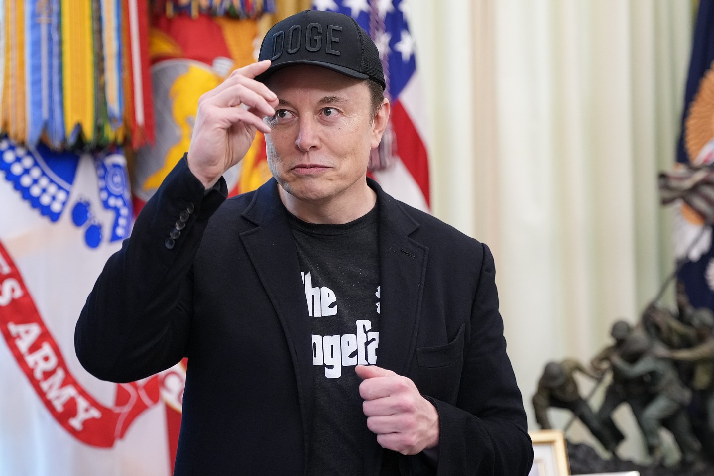 Elon Musk tips his hat
