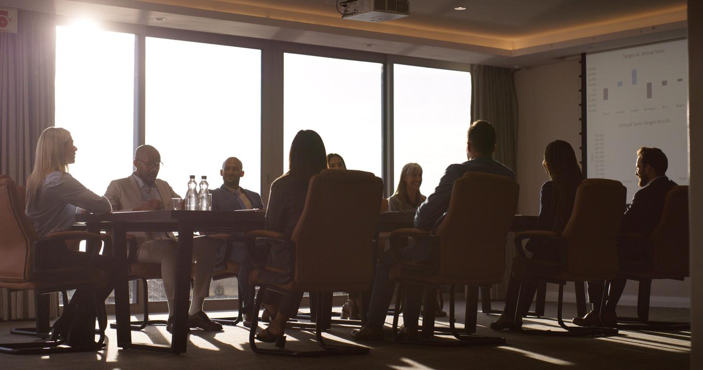 People in a boardroom.