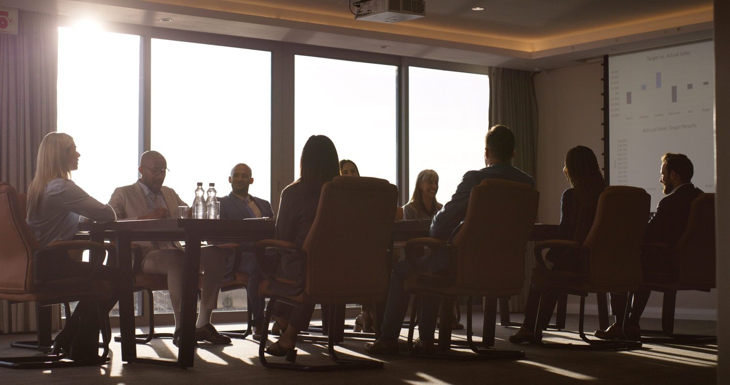 People in a boardroom.